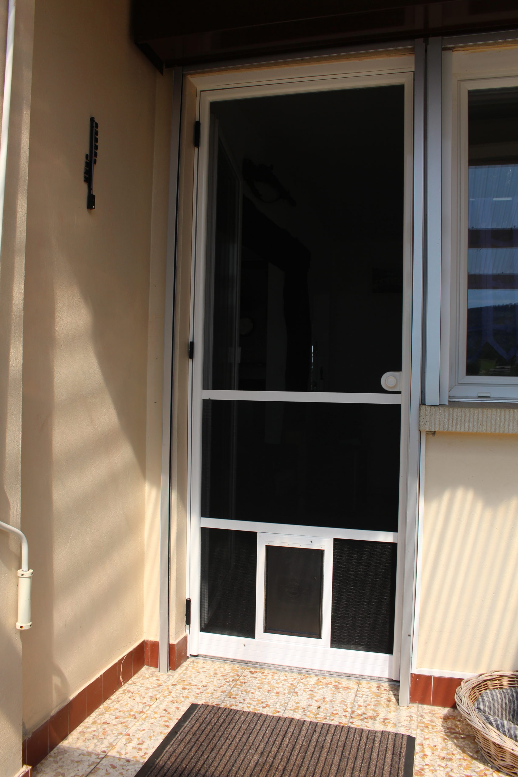 Moustiquaire porte battante